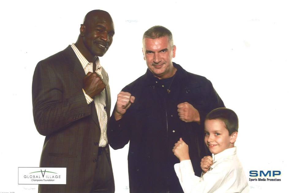 Evander Holyfield with Guido Carli